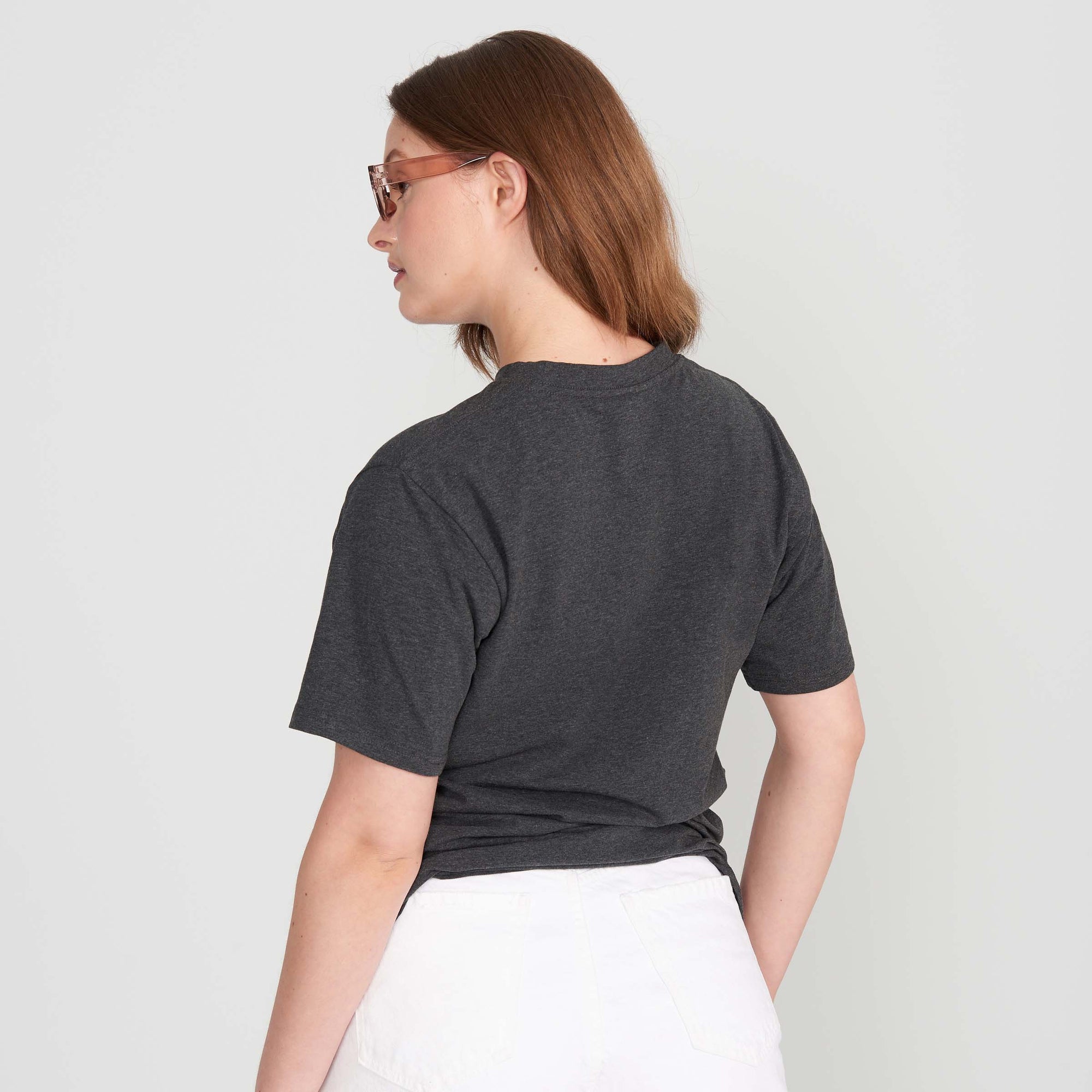 woman wearing shirt for back sweat in grey