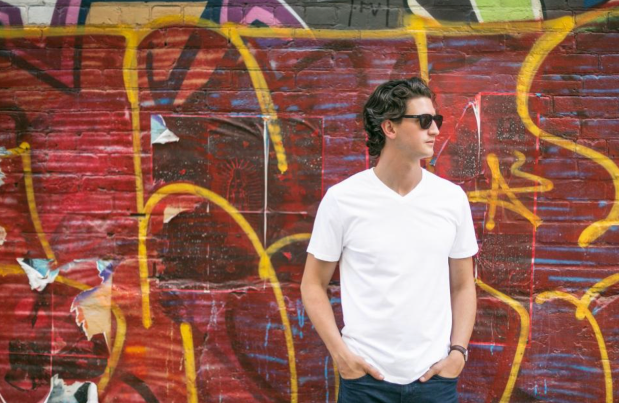 man in a sweat proof v-neck t-shirt